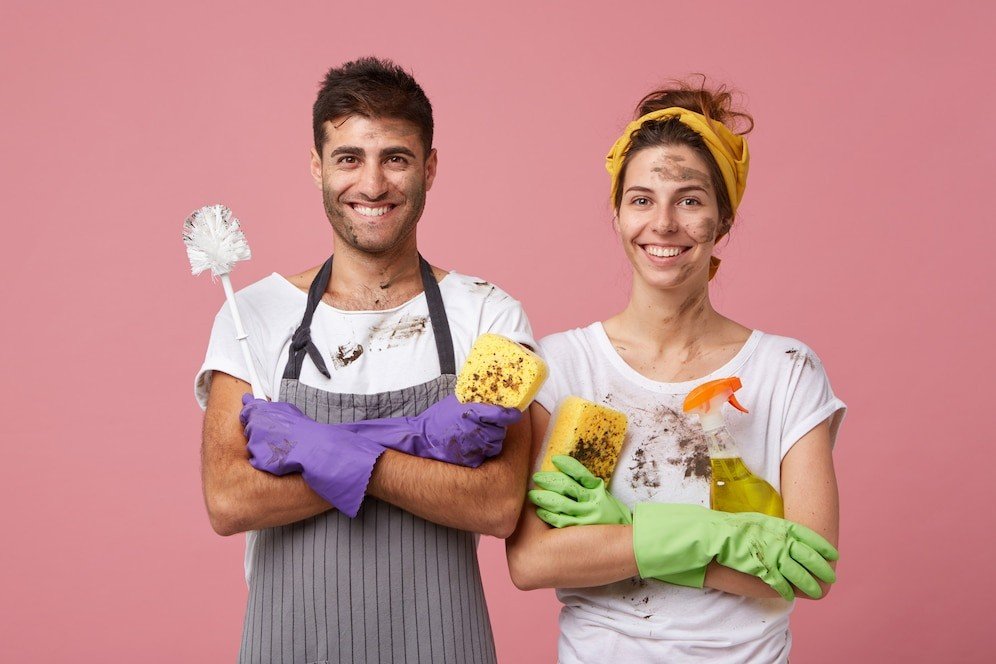 happy married male female wearing casual clothes standing crossed hands being glad clean their house holding cleaning equipment isolated 273609 7828 Builder Cleaning Experts In Edinburgh